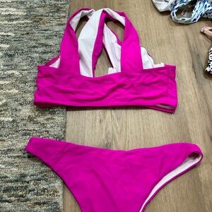 Pink bathing suit. Never worn. Comes with padding.